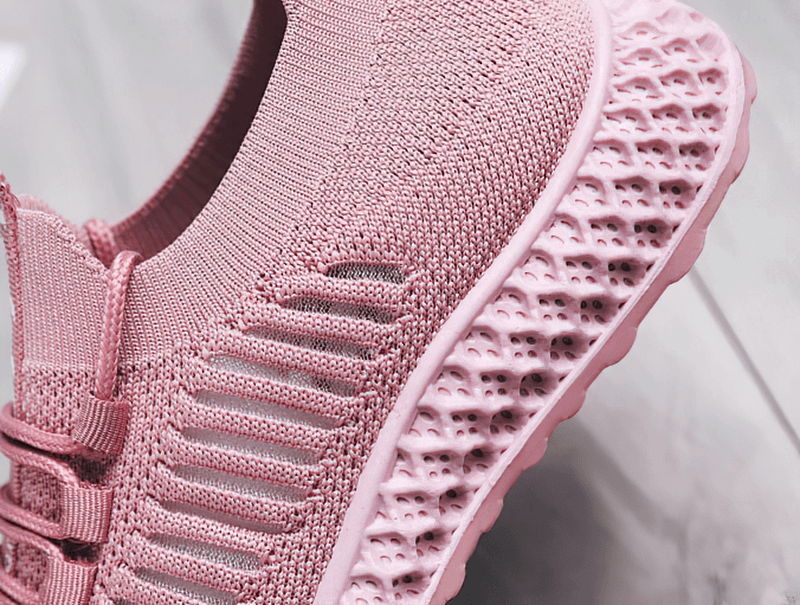 Pink mesh breathable sneakers with lace-up detail and flat bottom, perfect for casual wear and walking. Style: SF0265.