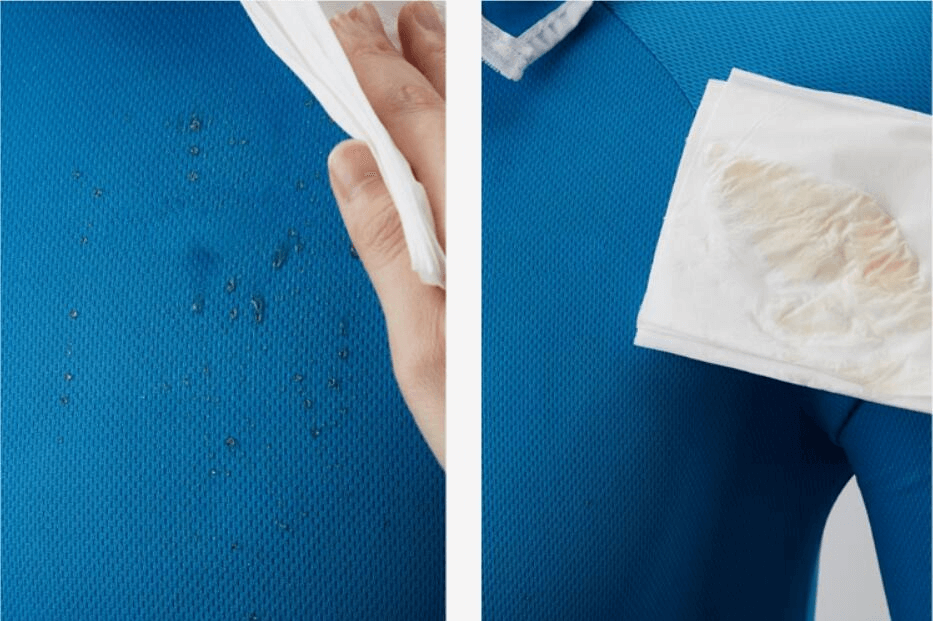 Blue waterproof fabric of men's lightweight sunscreen jacket repelling water with tissue.