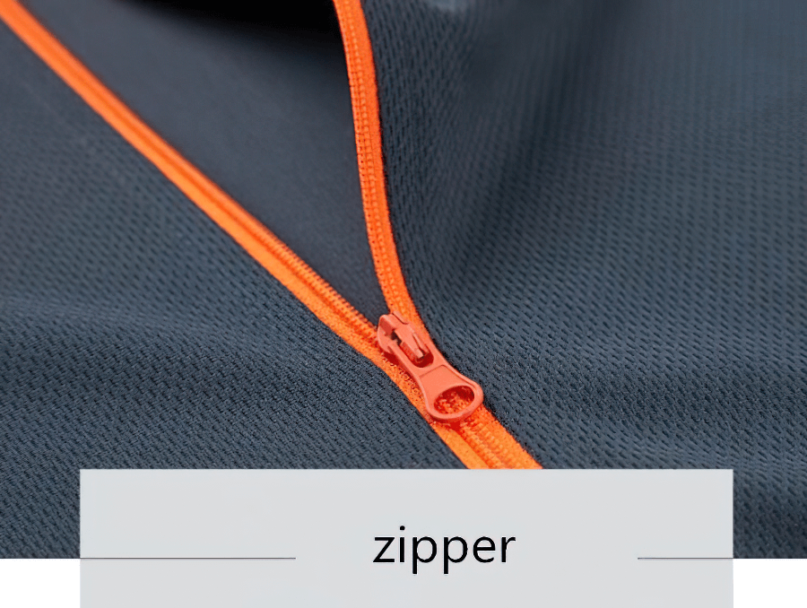 Close-up of a bright orange zipper on a casual lightweight men's sunscreen jacket with a breathable material.