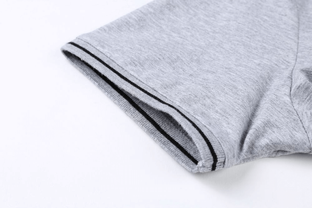Close-up of sleeve with black stripes on a gray V-neck cotton t-shirt showcasing premium fabric and stylish design.
