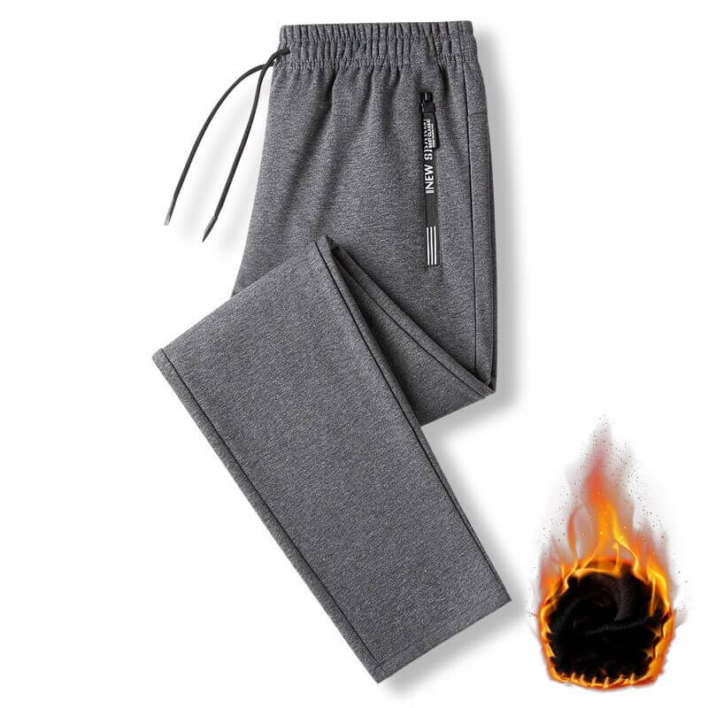 Casual men's thick windproof pants in grey with drawstring. Warm sportswear ideal for cold weather and stylish comfort.