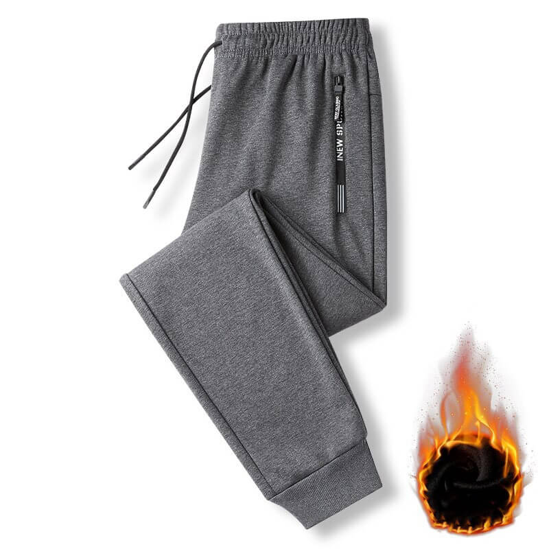 Casual men's thick pants in gray, windproof and warm sportswear with drawstring and zipper detail.