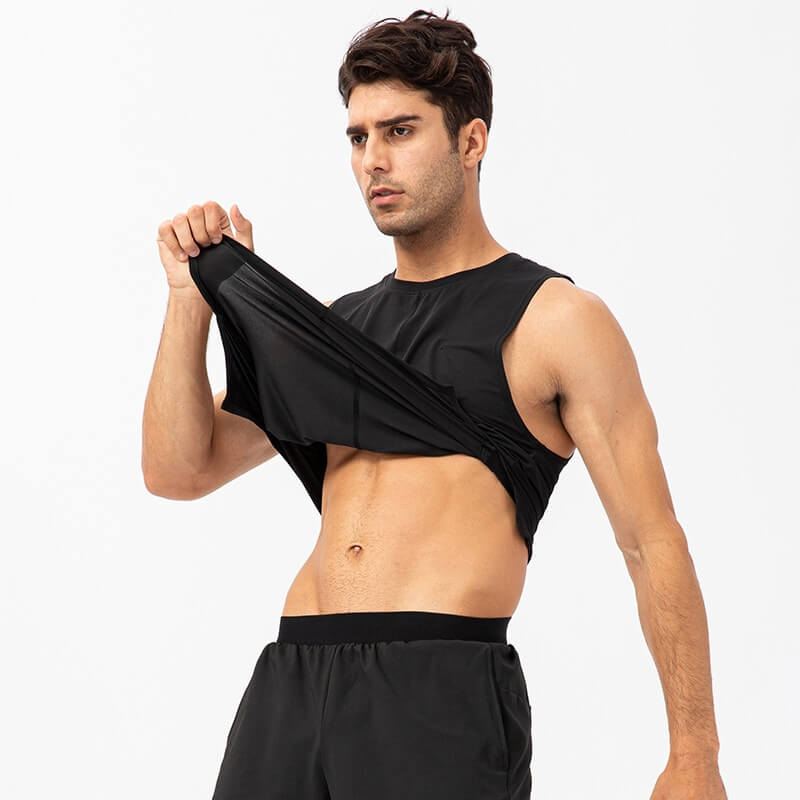 Man wearing casual black O-Neck mesh tank top, perfect for men's basketball, showcasing breathability and comfort.