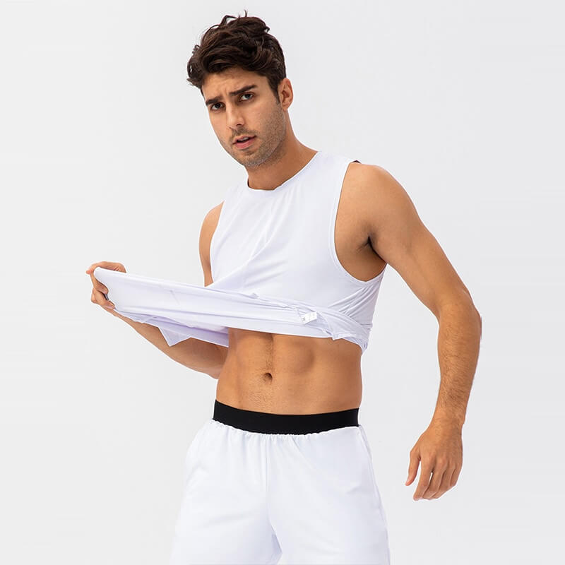 Man wearing white breathable mesh O-neck basketball tank top for high-intensity workouts, demonstrating flexibility and comfort.