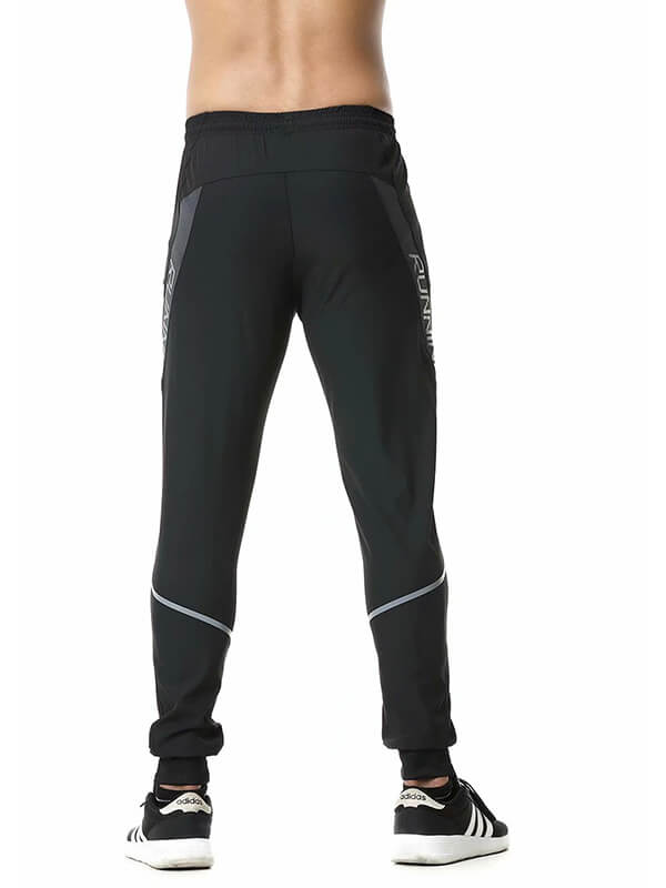 Back view of men's black casual running joggers with zipper pockets, elastic waistband, and stylish design for athletic performance.