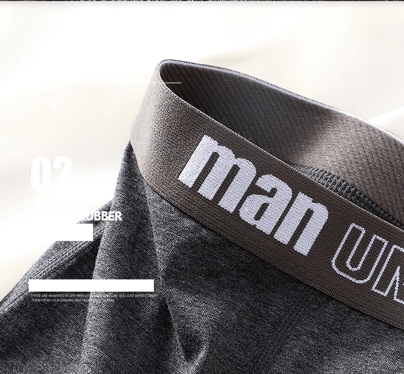 Casual solid color cotton boxers for men with a stylish waistband, showcasing breathable and comfortable fabric.