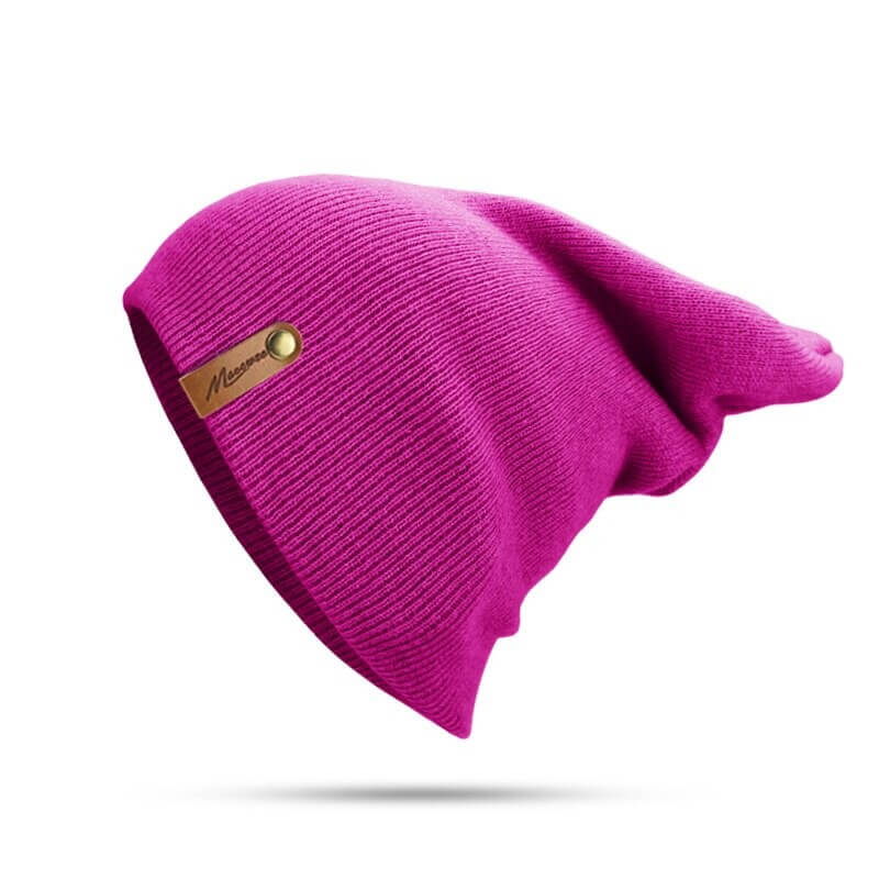 Bright pink casual knitted beanie, unisex and made from soft cotton, ideal for winter warmth and comfort.