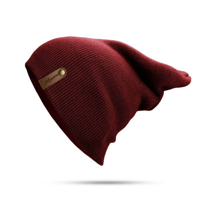 Casual solid color knitted beanie in rich burgundy, perfect for winter warmth and style. Unisex design fits 21.65-24.8 inches head sizes.