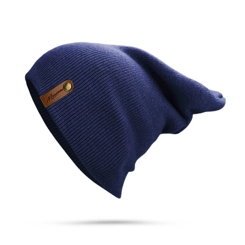 Unisex blue knitted beanie for winter warmth and comfort.