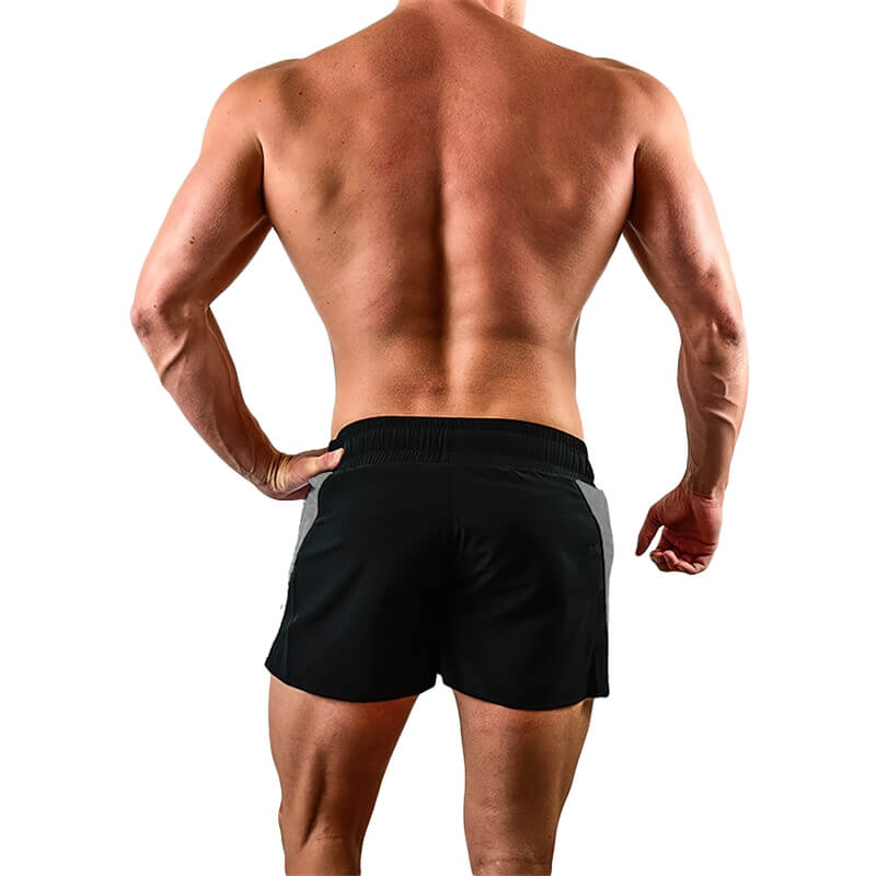 Back view of a man wearing black athletic drawstring shorts, ideal for gym or running, showcasing muscular build and breathable fabric.