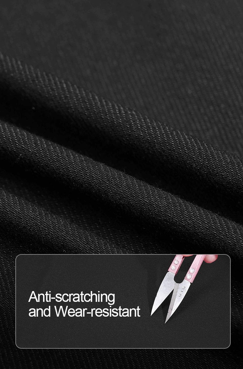 Black waterproof fabric demonstrating anti-scratching and wear-resistant properties for trekking trousers.