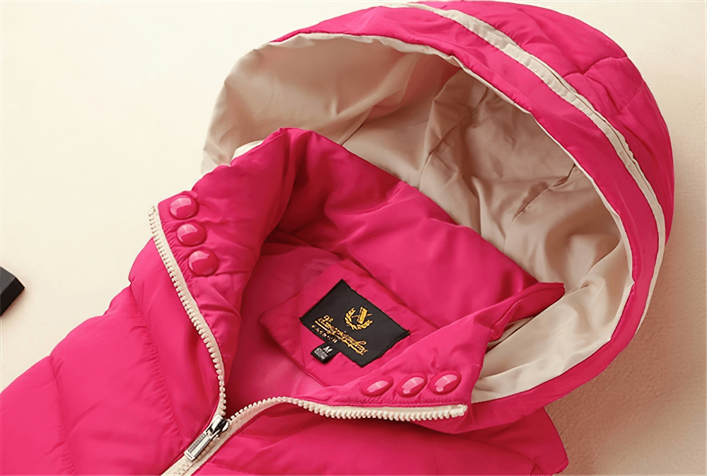Vibrant pink hooded down vest for women with adjustable collar and zippers, perfect for warmth and style. SF0068 casual winter sleeveless jacket.