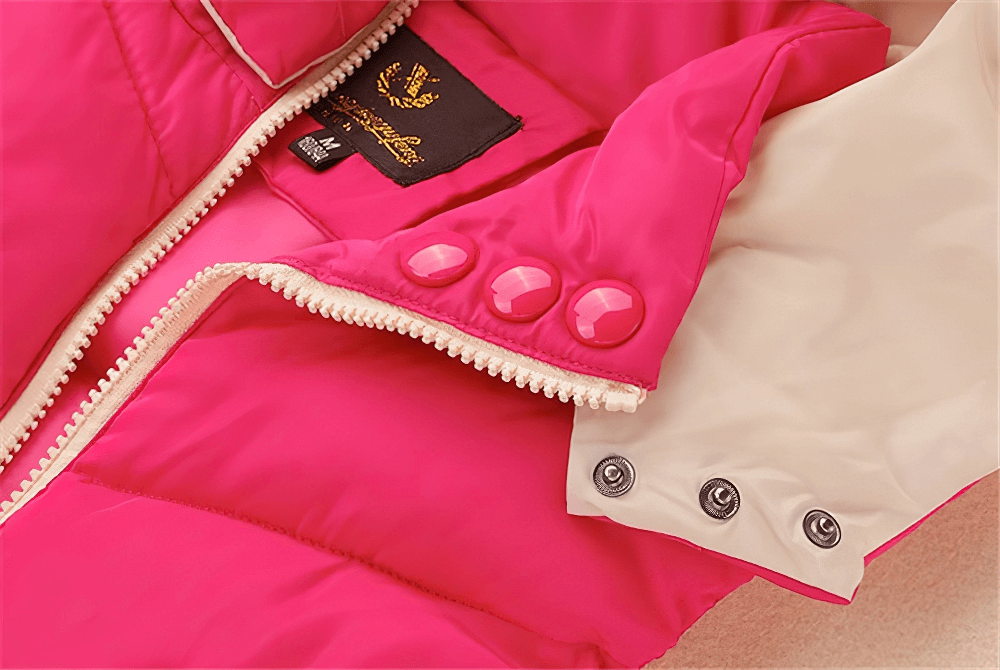 Close-up of pink casual zipper hooded down vest with hood buttons and zipper details, showcasing stylish design and warm materials for women.