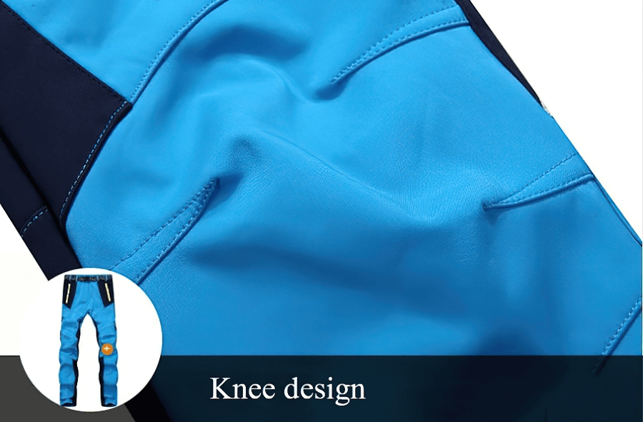 Close-up of blue waterproof fleece pants highlighting knee design for skiing and outdoor activities, style SF0643.