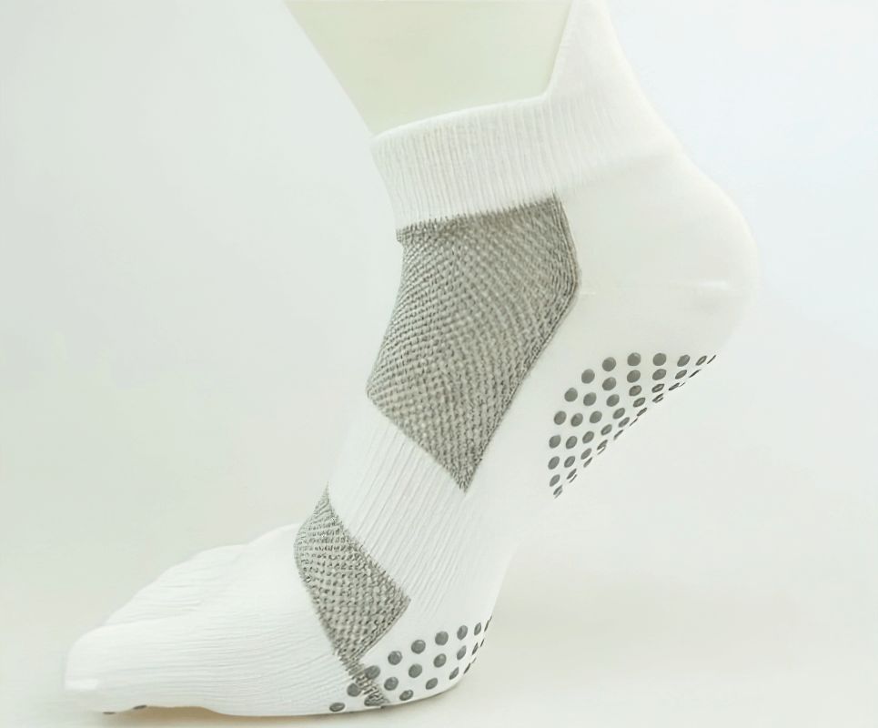 White compression breathable socks with split toes and non-slip dots, perfect for male casual wear, showcasing tear-resistant cotton.