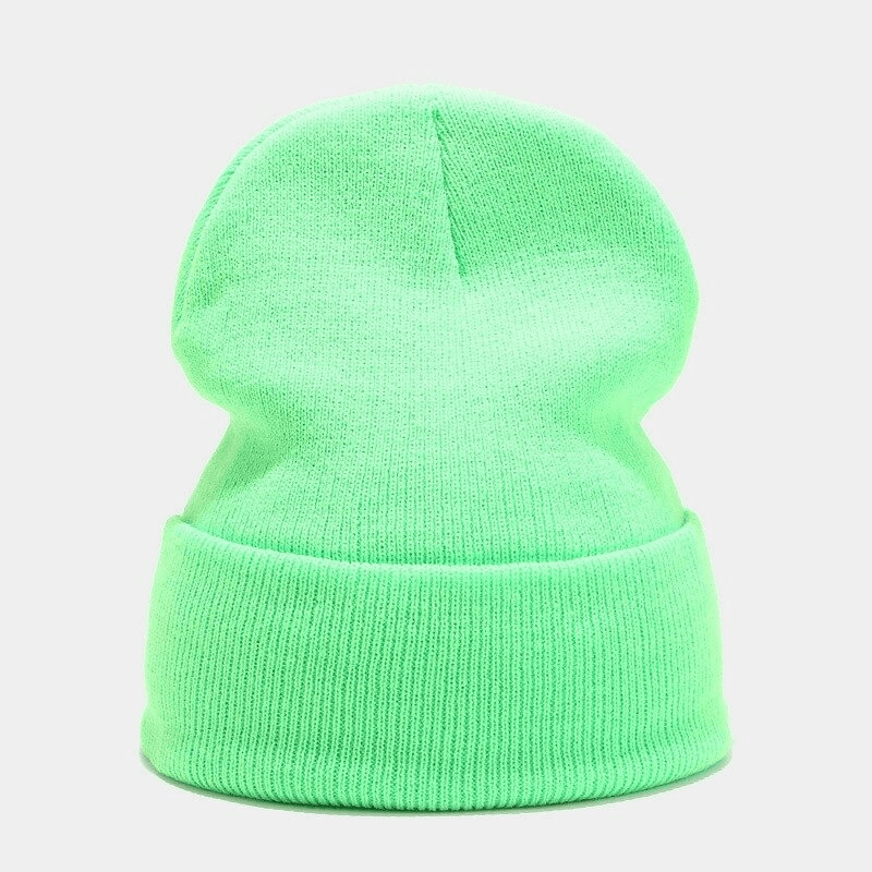 Vibrant green unisex knitted hat made of acrylic for warmth and comfort, perfect for both men and women in casual style.