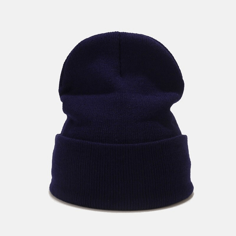 Unisex cool knitted plain hat in deep navy, perfect for all-year casual wear, made from acrylic for warmth and style.