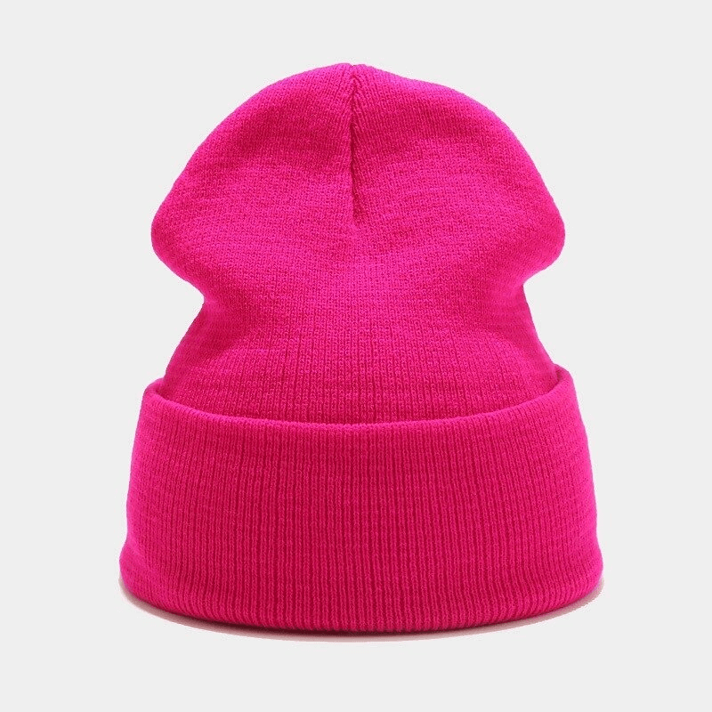 Vibrant pink knitted unisex hat made of acrylic with a plain design, perfect for a snug fit and casual style all year round.