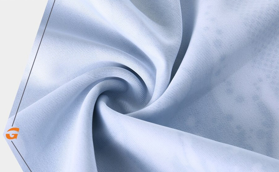 Close-up of light blue Cool Sports Neck Gaiter fabric showcasing its soft, breathable texture.