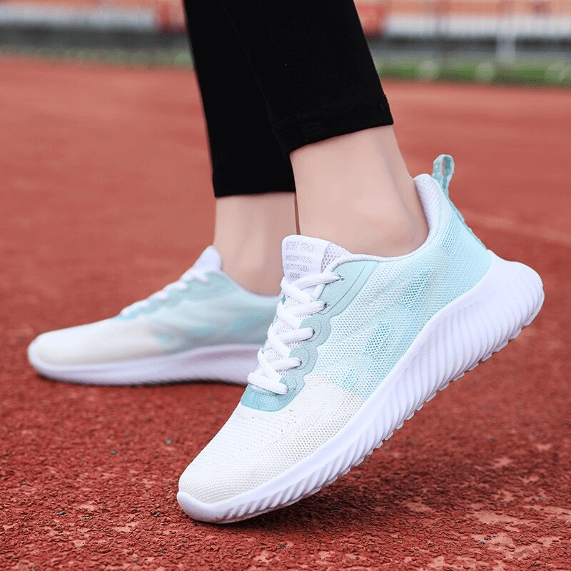 Lightweight double color women's running shoes with quick-drying mesh upper and EVA outsole, perfect for fitness and flexibility.