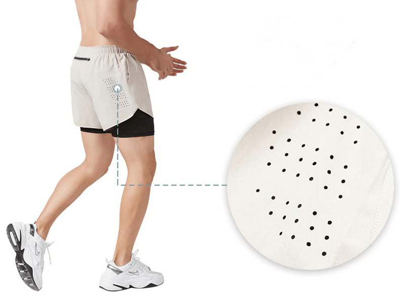 Men's beige double-deck training shorts with back pocket and ventilation holes, ideal for gym, running, and sports performance.