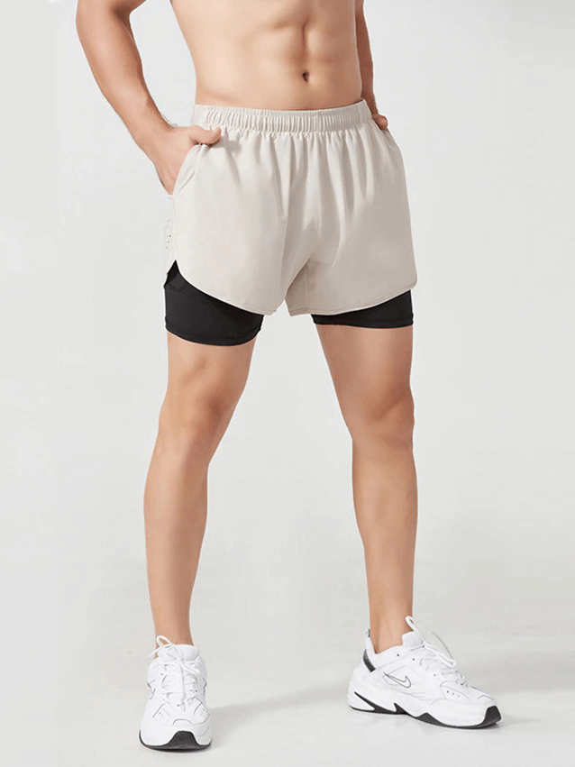 Stylish double-deck men's training shorts with pocket back, ideal for summer workouts, running, or gym. Model wearing SF0440 shorts.