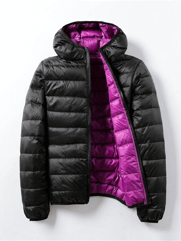 Black double-sided women's parka with purple interior, featuring a hood and 90% white duck down