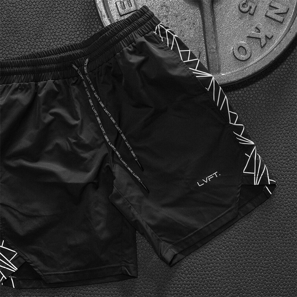 Men's solid black drawstring shorts for running and bodybuilding against gym backdrop, perfect for fitness and workout.