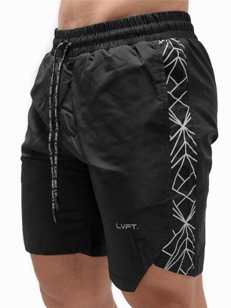 Men's black drawstring running shorts with geometric side pattern, ideal for gym and fitness, featuring quick-drying polyester material.