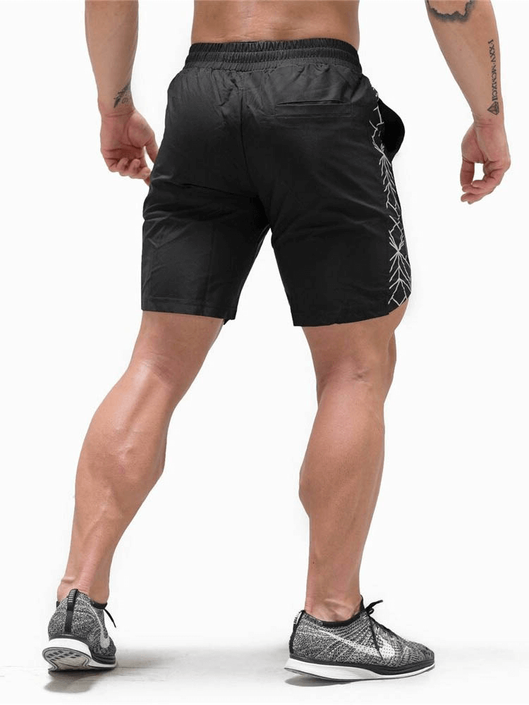 Men's drawstring solid color running shorts perfect for gym and fitness, showcasing comfort and style in durable quick-drying fabric.
