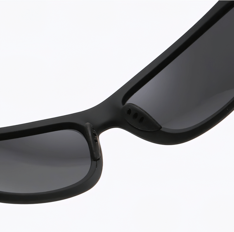 Close-up of Driving Sports Polarized Sunglasses SF0226 with durable black plastic frames and UV400 polycarbonate lenses for outdoor use.