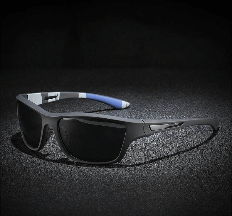Sleek polarized sunglasses with black frames and blue accents, ideal for driving, sports, and hiking. UV400 protection and anti-glare design.