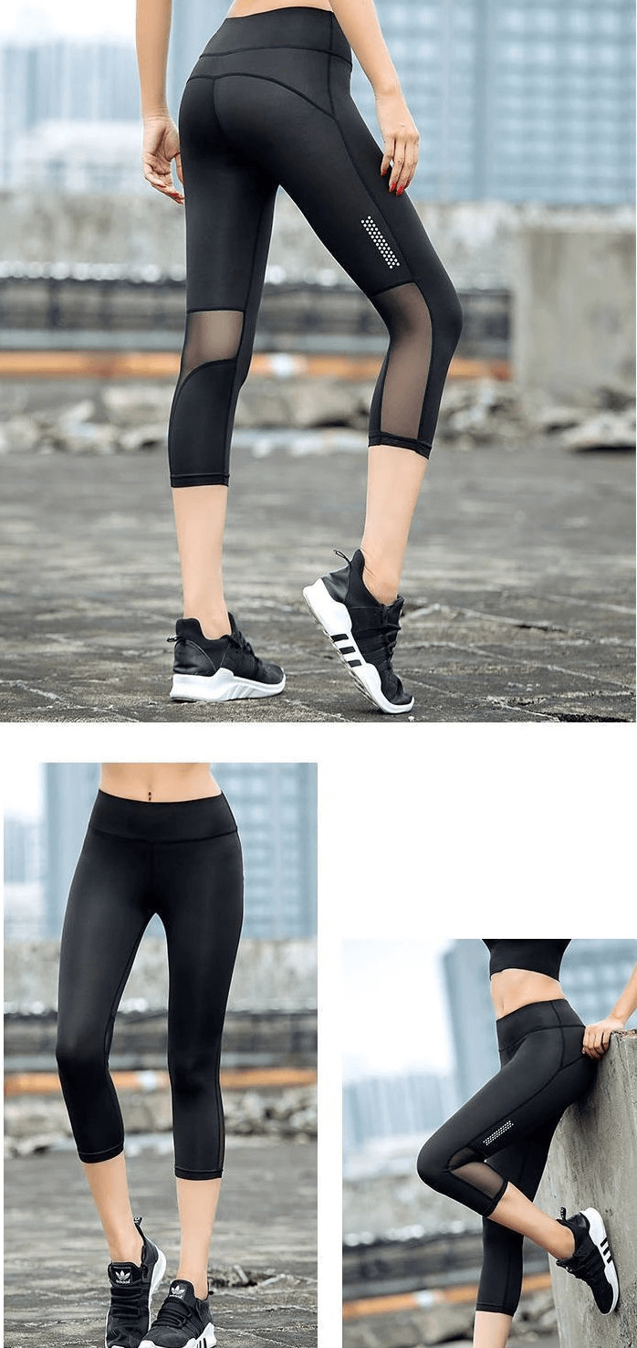 Woman wearing black high-waisted cropped leggings with mesh panels, showcasing breathable design perfect for yoga.