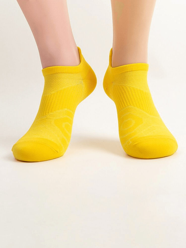 Bright yellow unisex ankle socks for comfort and mobility.