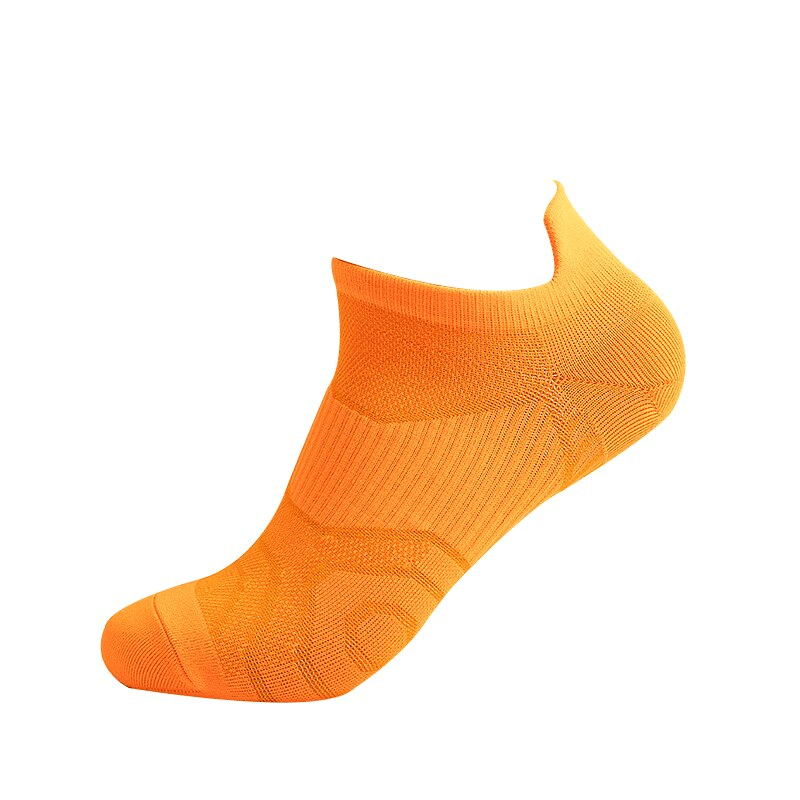 Bright orange elastic breathable unisex short ankle socks made from cotton and polyester, offering comfort and durability.