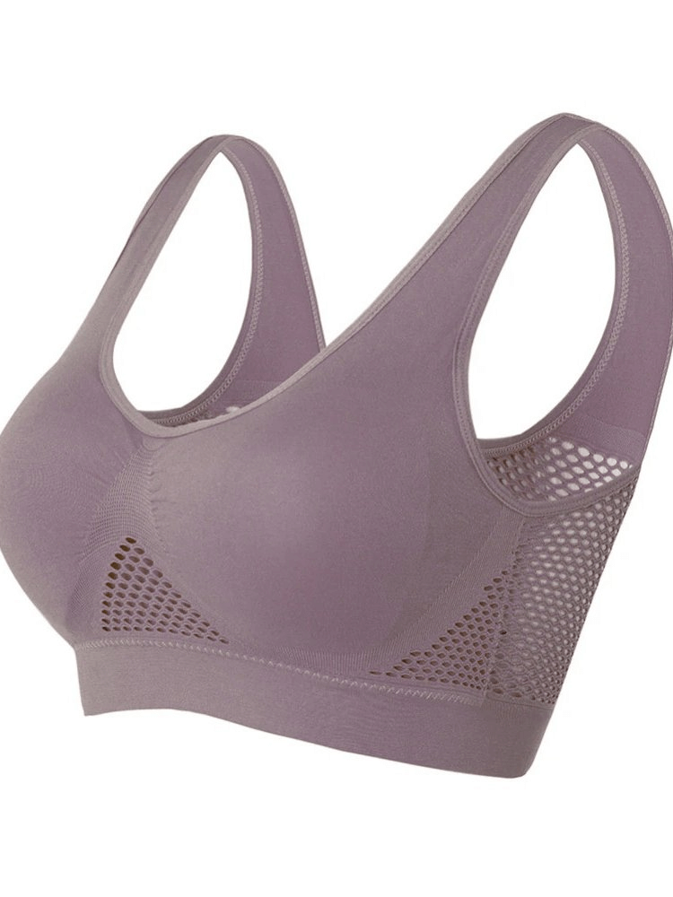Elastic breathable women's sports bra with holes, in purple, featuring wire-free, seamless design for ultimate comfort. Perfect for workouts.