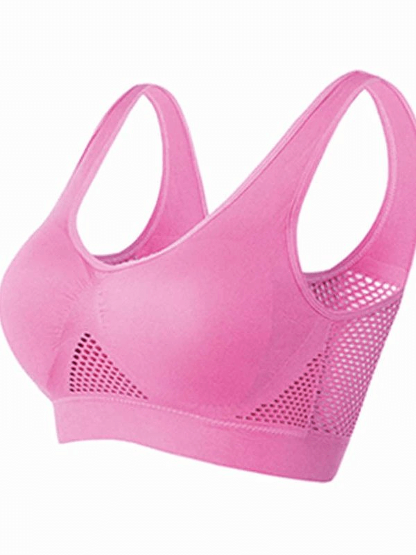 Pink elastic breathable women's sports bra with holes, wire-free and seamless for all-day comfort, style SF0448.