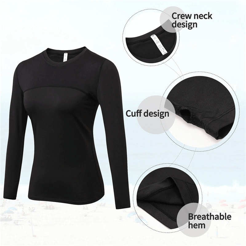 Elastic long sleeve running top for women with crew neck design, cuff details, and breathable hem suitable for gym and yoga.