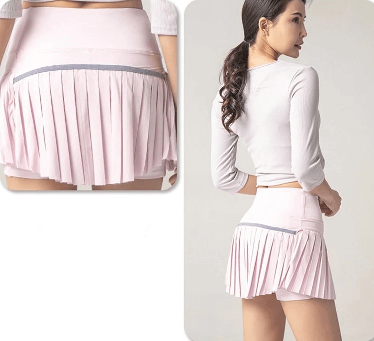 Elastic pleated skirt-shorts in light pink, women's sportswear. Stylish, lightweight, and breathable for yoga and running. SF0208 model.
