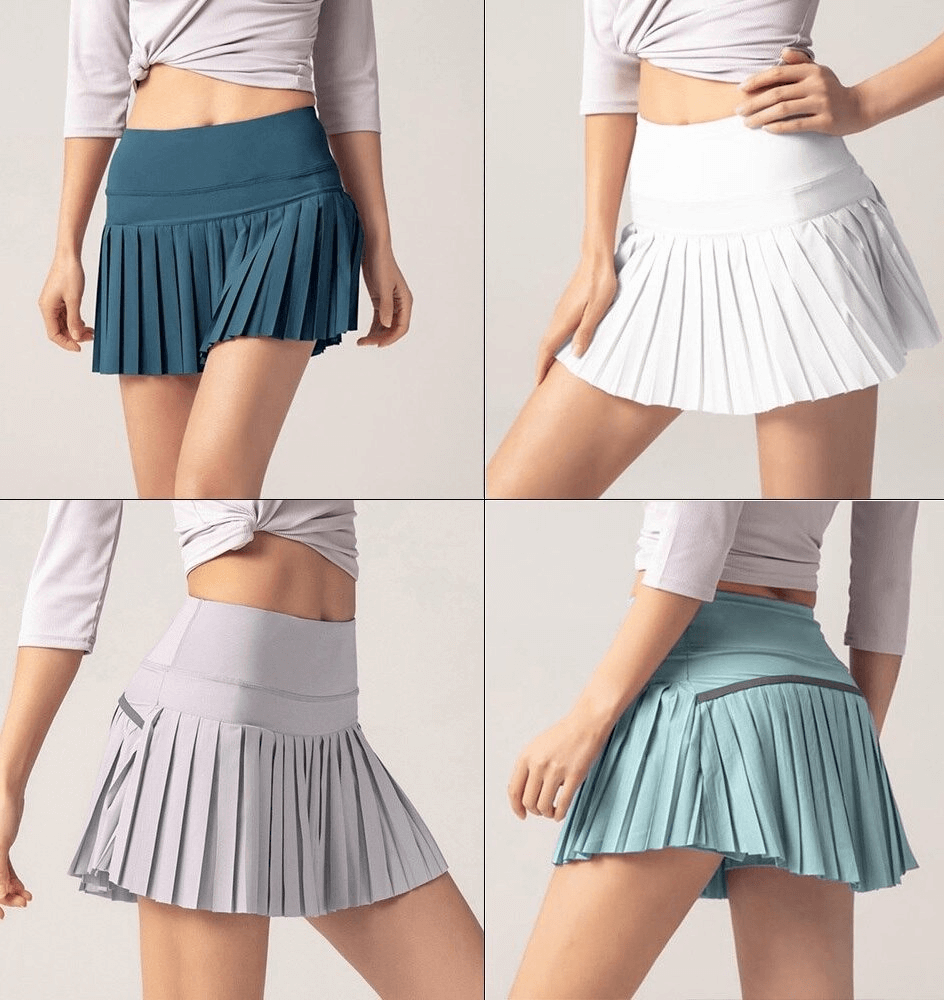 Four models wearing elastic pleated skirt-shorts in various colors, showcasing stylish women's sportswear, perfect for active lifestyles.