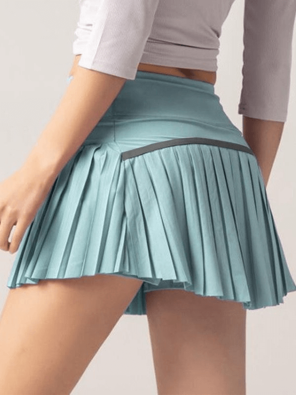 Elastic Pleated Skirt-Shorts for Women, perfect for yoga and fitness. Lightweight polyester, breathable, slim fit. Styled in a solid pattern.