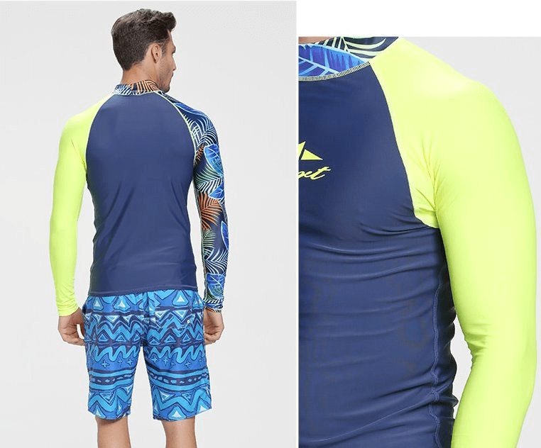 Man wearing elastic quick-dry long sleeve diving top in blue and neon with colorful shorts, perfect for surfing and kitesurfing.
