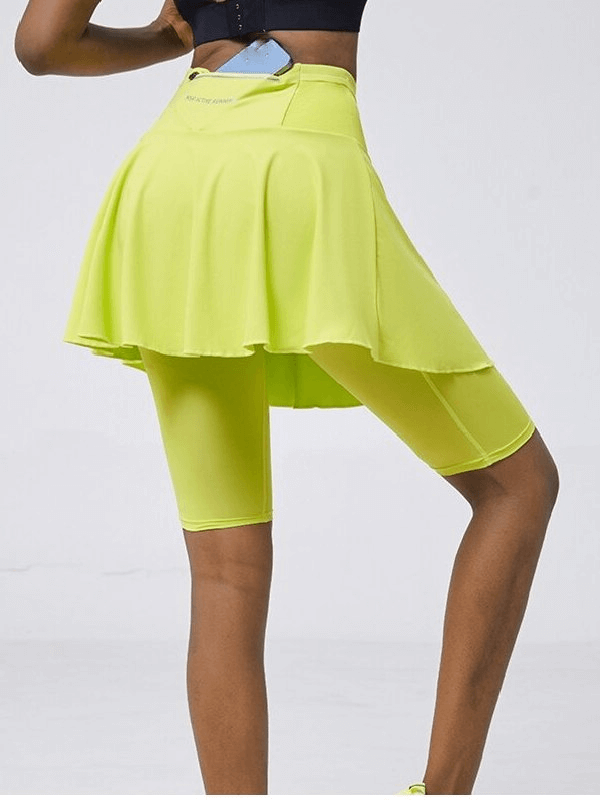 Elastic Quick Dry Women's Skirt-Shorts with high waist in bright yellow, perfect for tennis and golf, featuring breathable spandex material.