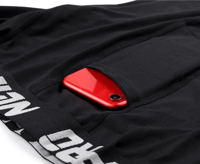 Black elastic men's running pants with a phone pocket, featuring a sleek red phone, ideal sportswear for training and running.