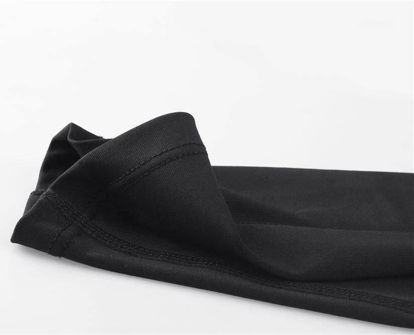 Elastic running men's pants, close-up of black stretchy fabric showcasing comfort and modern style for optimal performance.