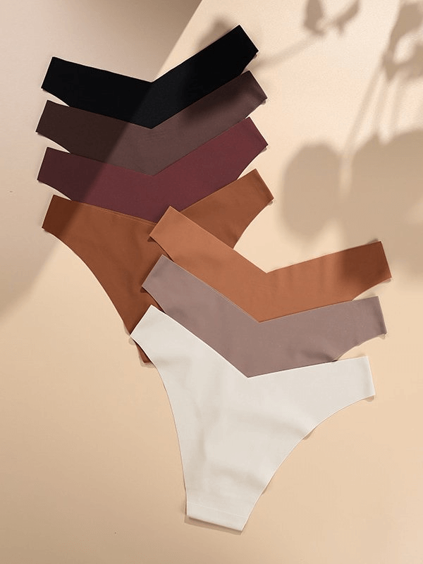 Colorful set of women's sports briefs with seamless, elastic design and breathable nylon fabric, ideal for activewear.