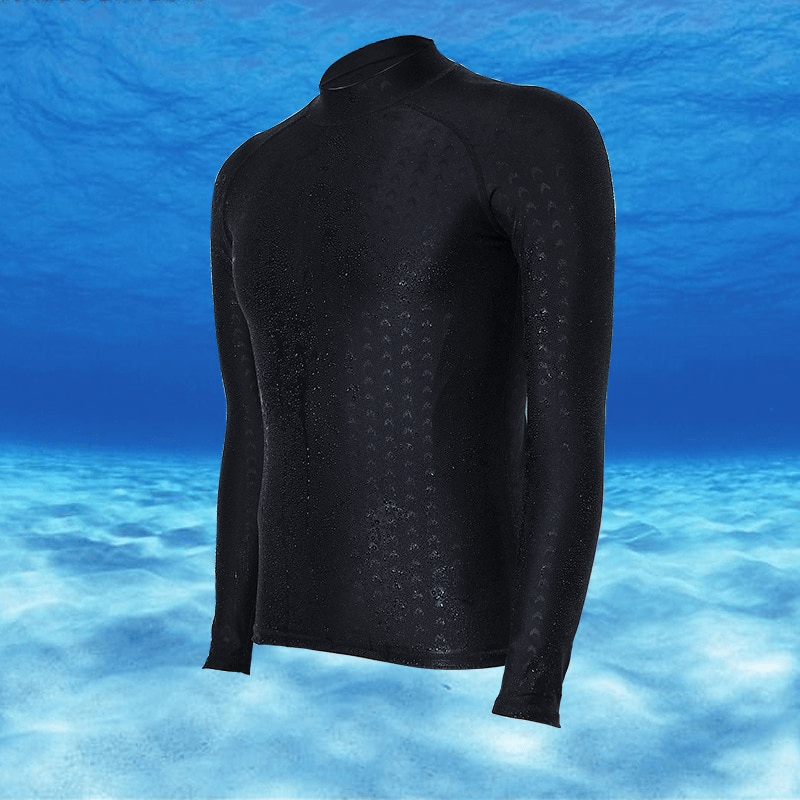 Stylish black elastic slim fit men's long-sleeve surfing rashguard set against an underwater background.