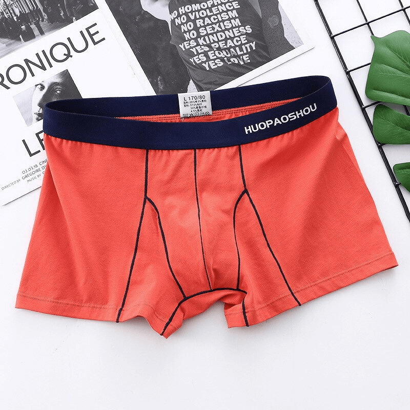 Men's cotton elastic soft boxer briefs in orange with navy waistband, providing comfort and a secure fit, model SF1162.