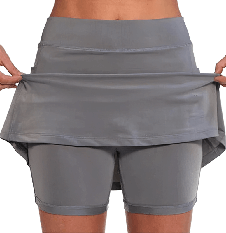 Elastic Sport Women's Skirt-Shorts with Side Pocket, showcasing comfortable and stylish design in a pleated silhouette, perfect for active women.