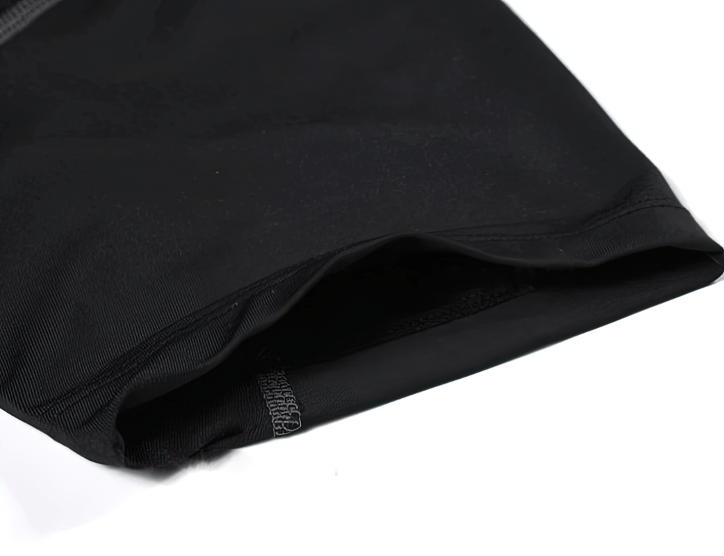 Close-up of black elastic quick-dry women's sports shirt sleeve, featuring breathable and high elastic fabric, perfect for gym workouts.